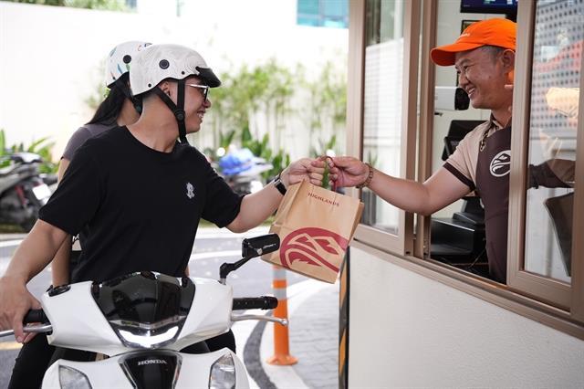 First-ever Highlands Coffee Drive-Thru store opens in HCM City