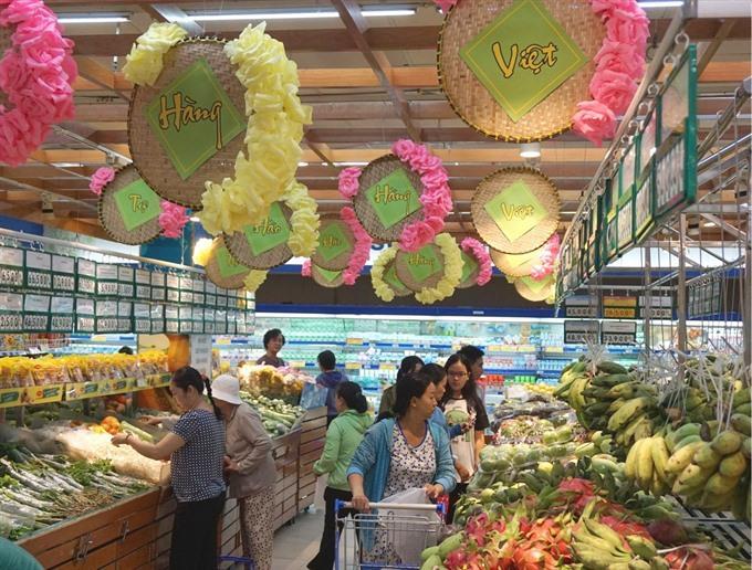 Shoppers get National Day promos