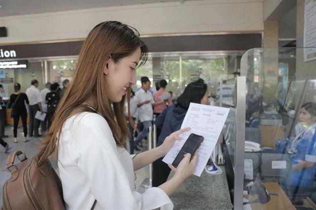 HCM City hospital ties up with MoMo e-wallet for patients bill payment